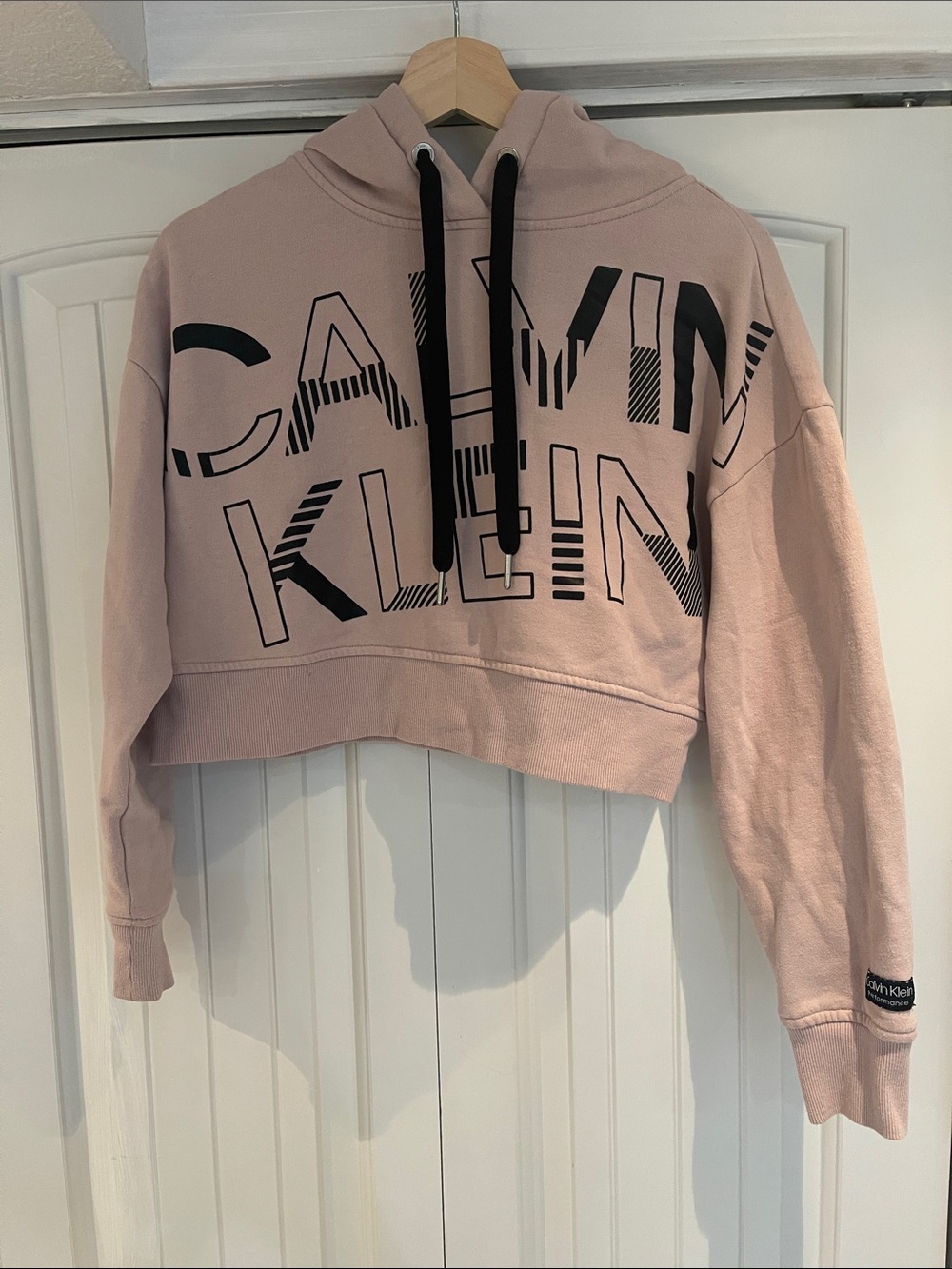 Calvin Klein Pink Cropped Logo Hoodie with Black Drawstrings
